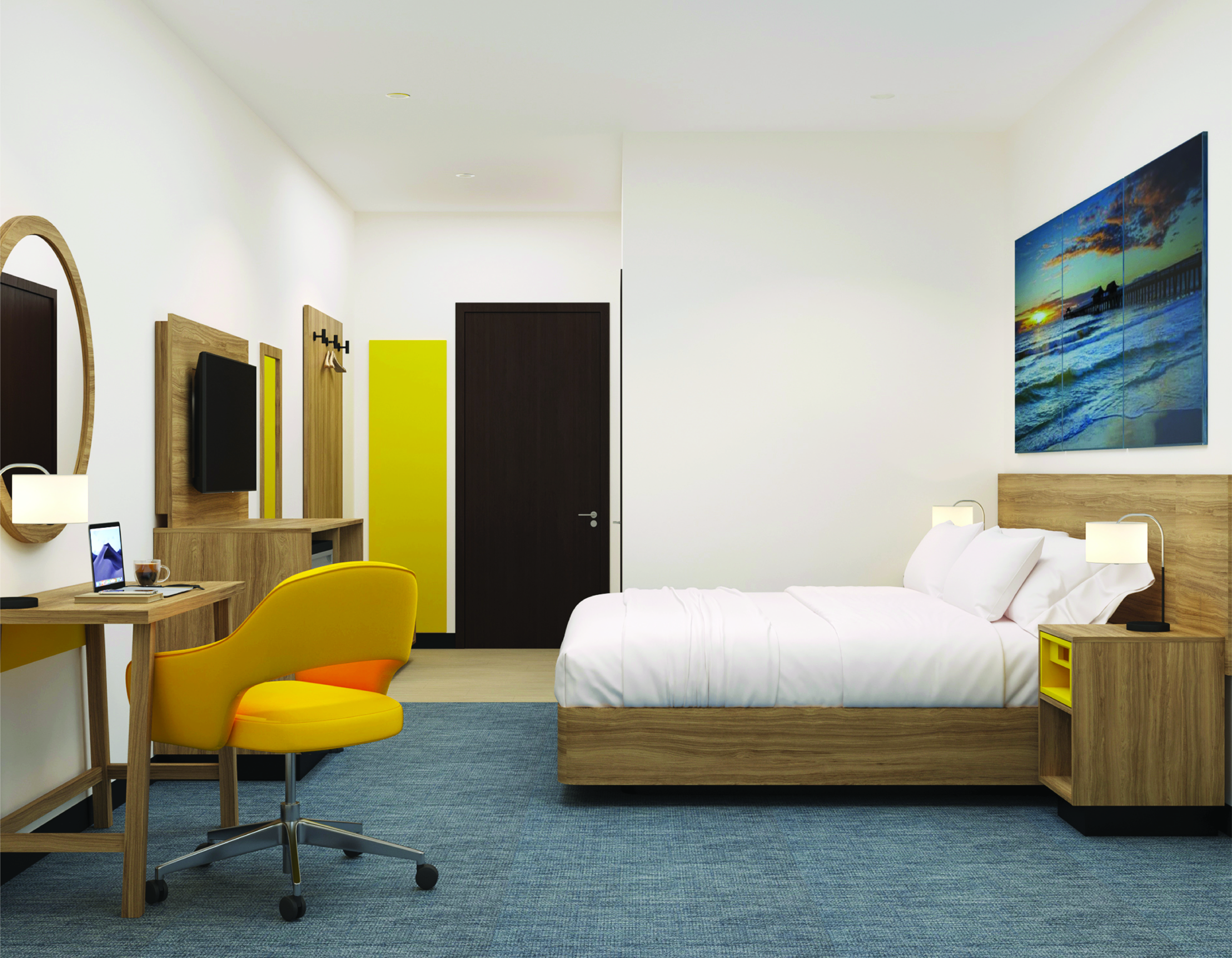 Days Inn guest room furnished with bed, desk and lounge chair