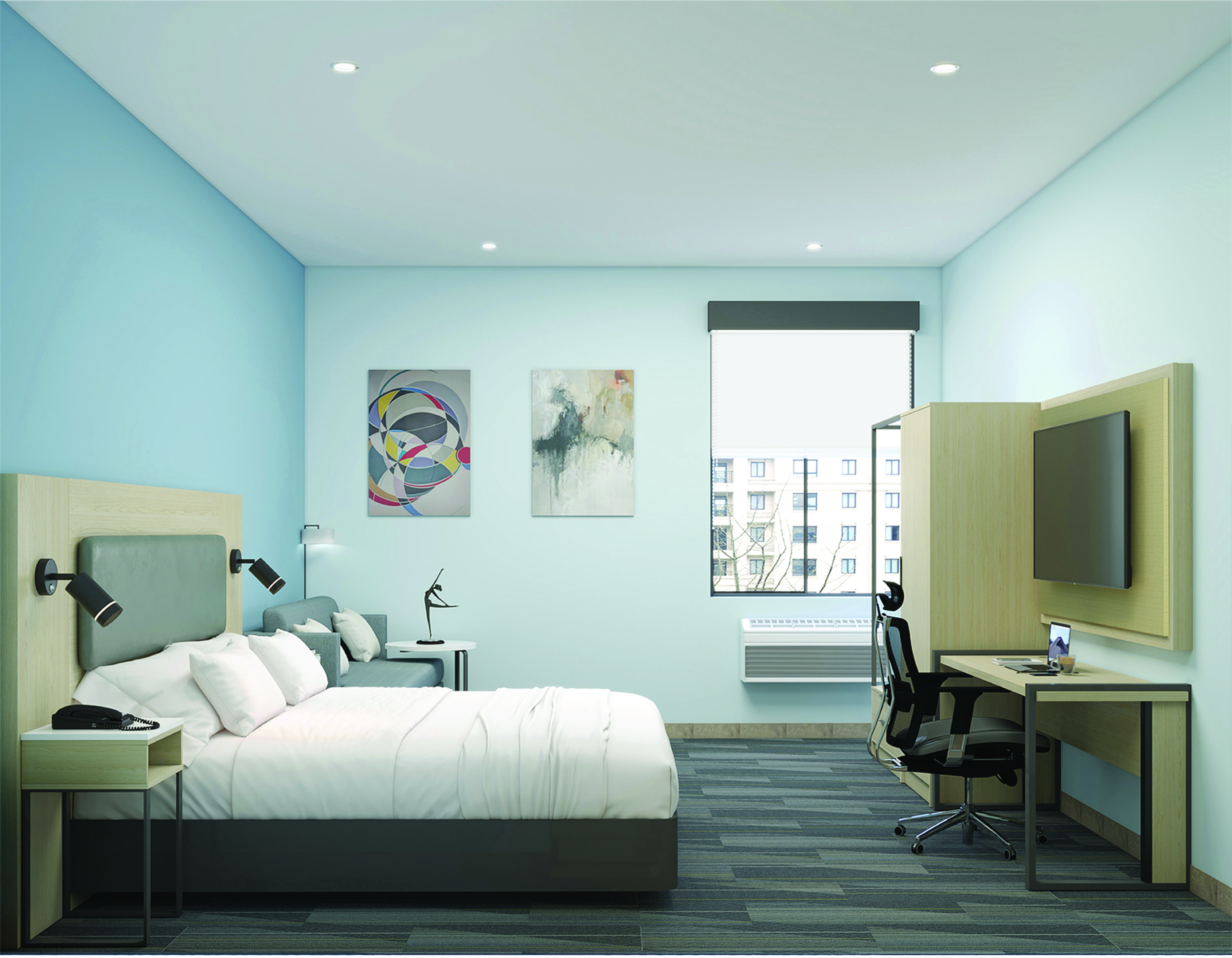 Best Western Plus guest room furnished with bed and sofa
