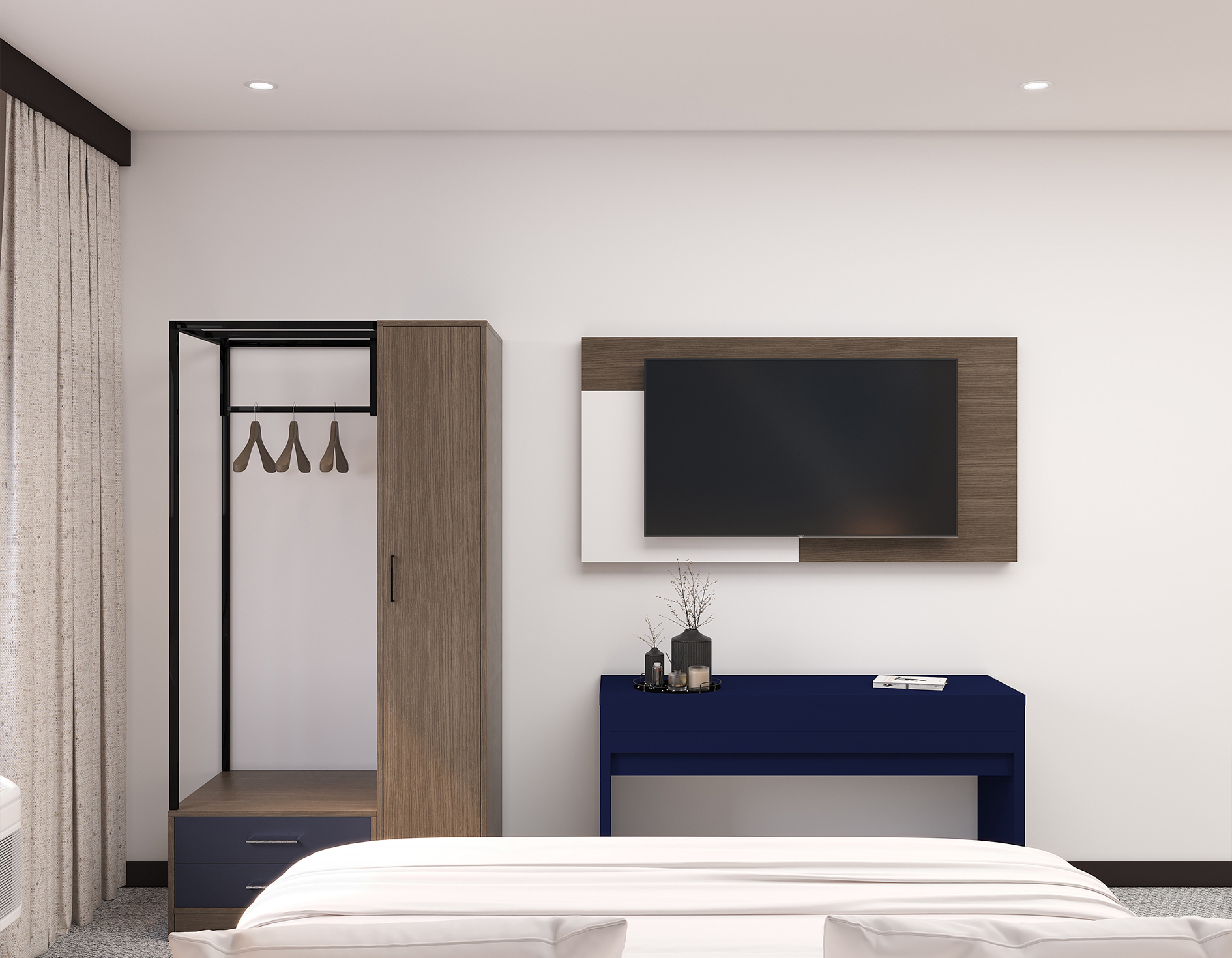 Guest room lounge area with sofa and ottoman coffee table