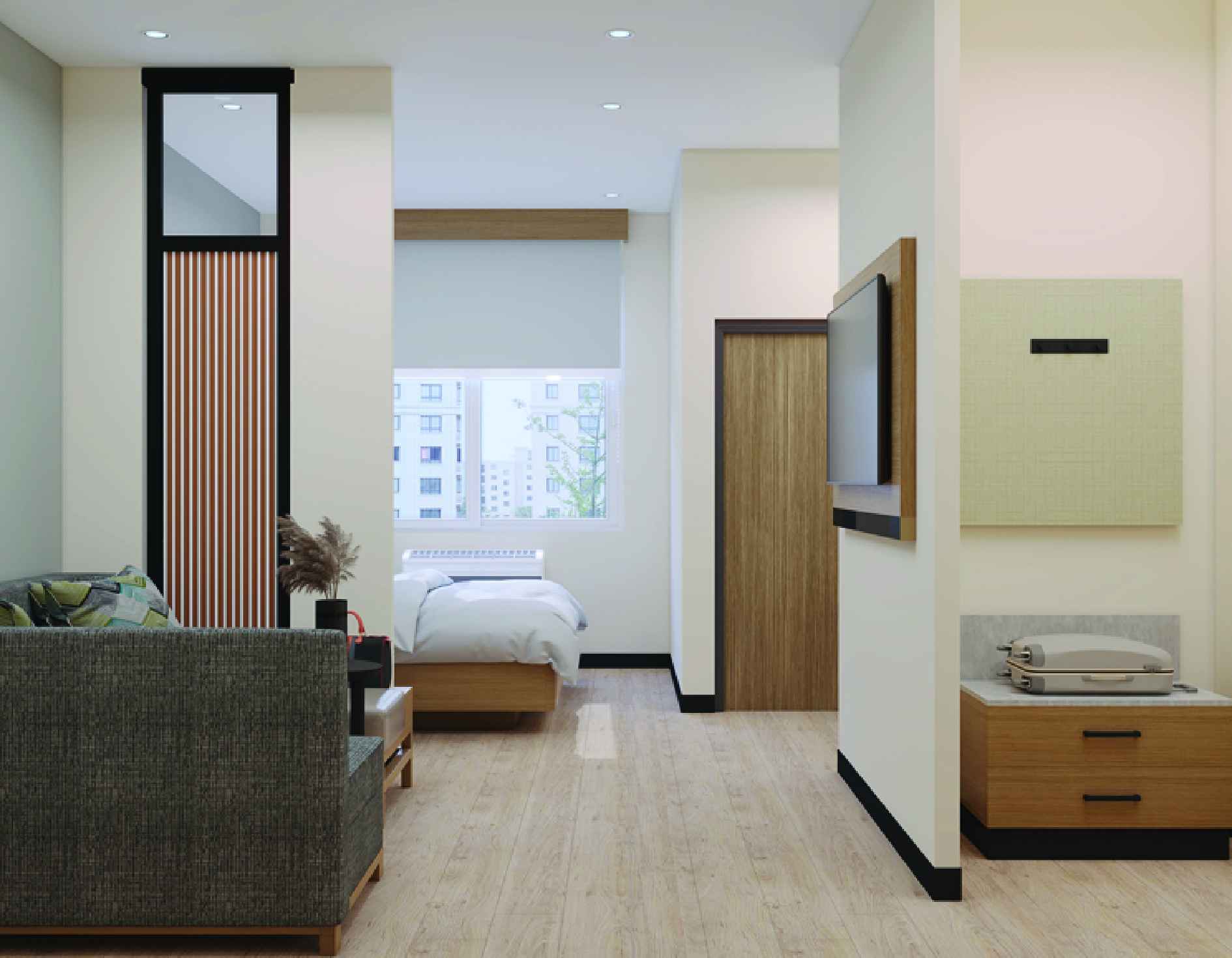 Hyatt Place guest room view toward bed and entry with wall-mounted TV