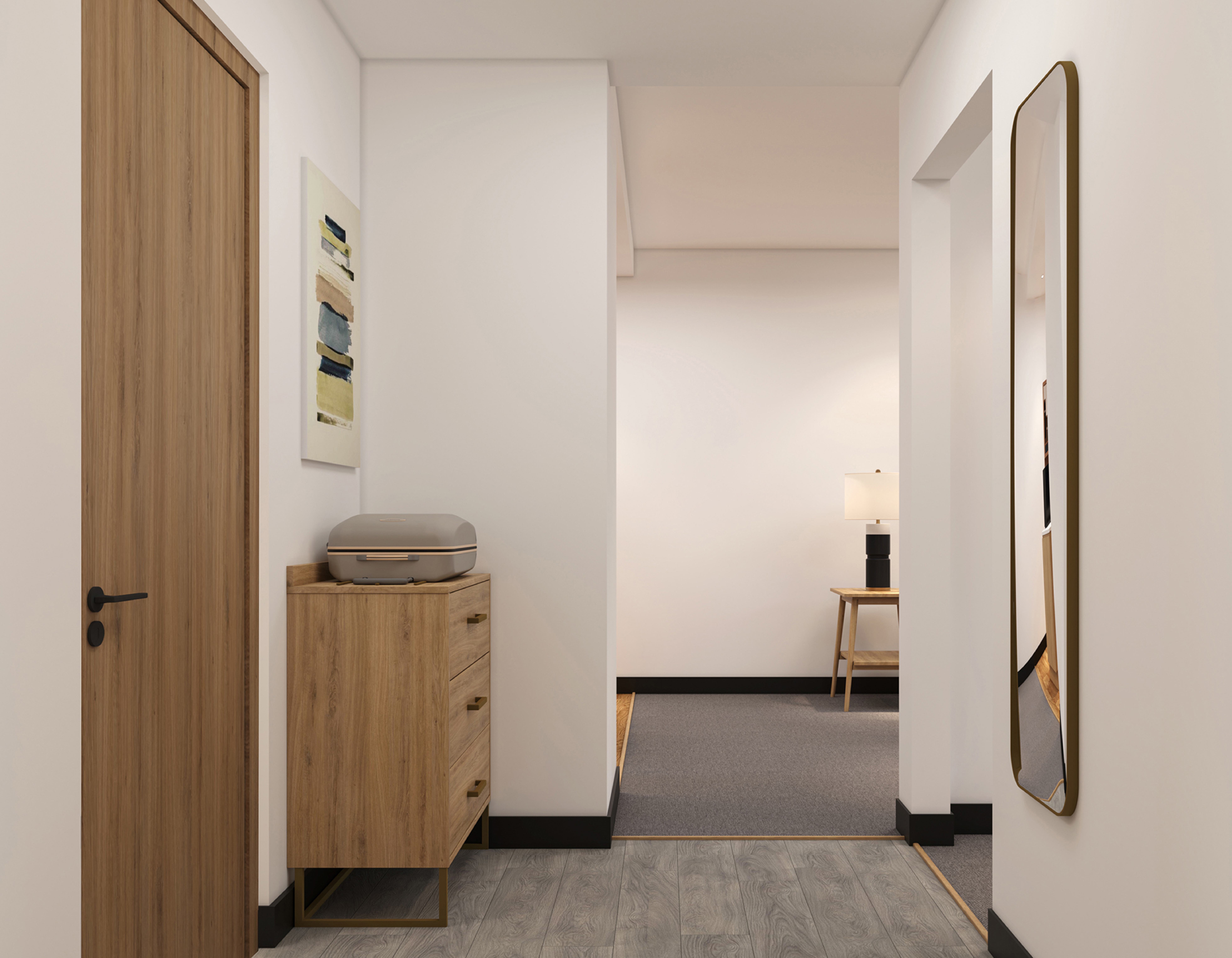 Guest room entry with dresser, artwork and mirrored closet door