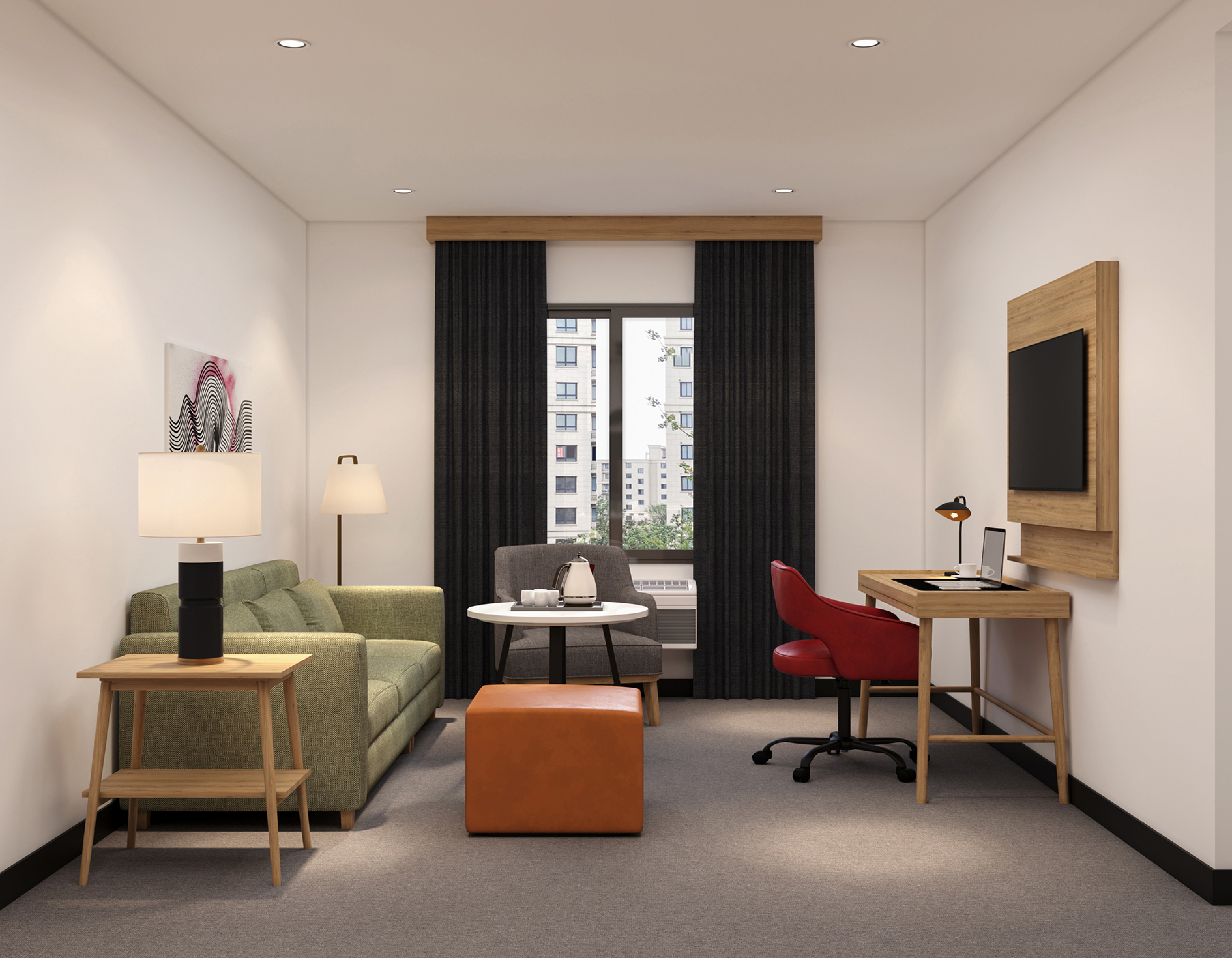 Living area with sofa, ottoman, desk and TV panel