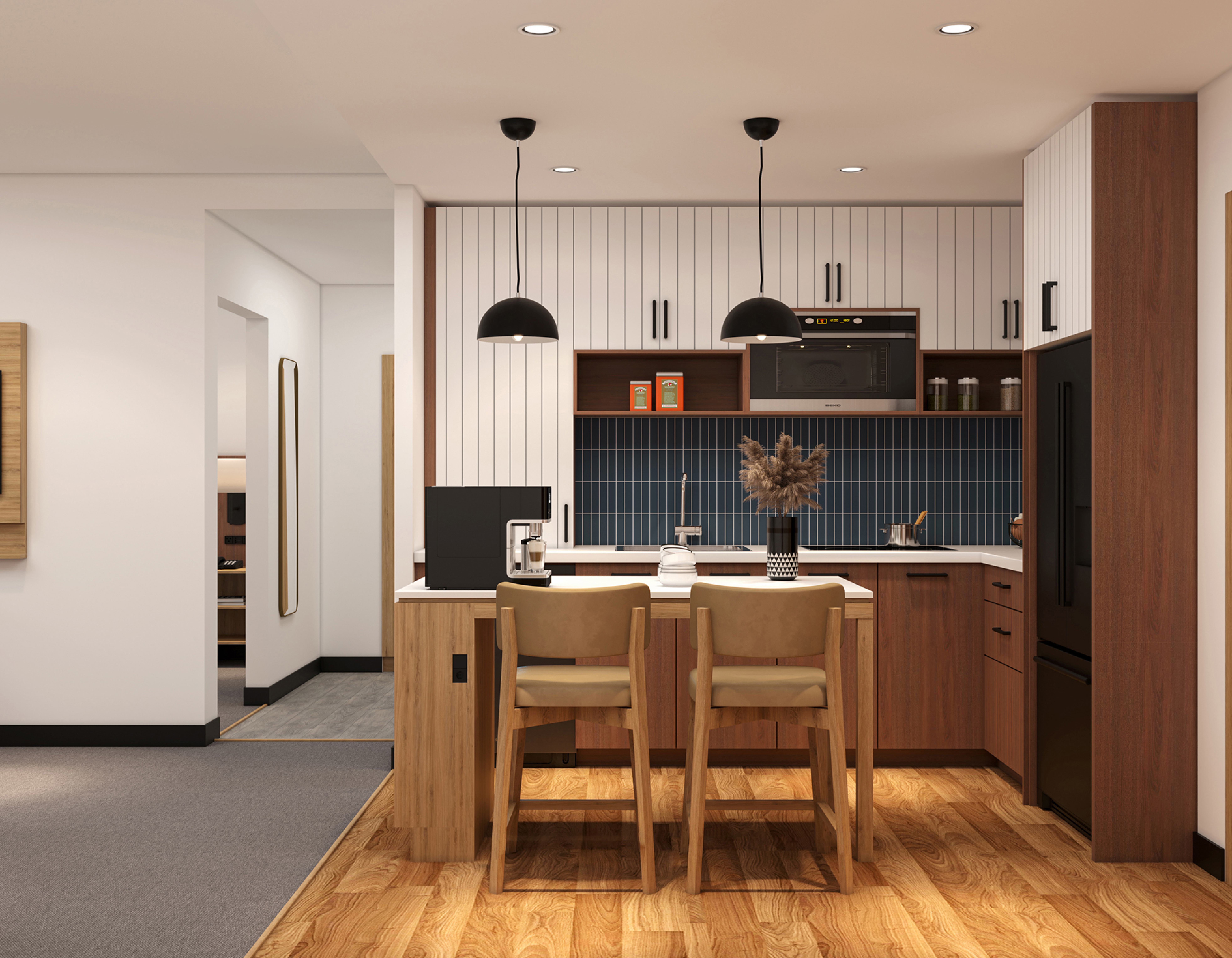 Kitchen with pendant lighting, dark cabinetry and tile backsplash